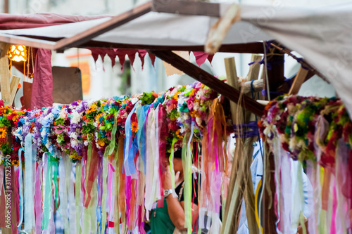 Crowns of flowers for young maidens in a historical reconstruction in Valvasone village, Friuli Venezia Giulia, Italy