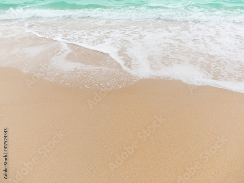 Beach top view.beach sand and blue sea in thailand. summer holiday travel concept.