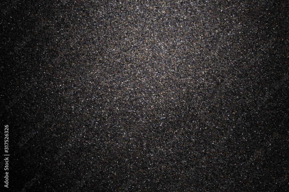 Fototapeta premium background of black crushed anthracite grain with copy space for your text