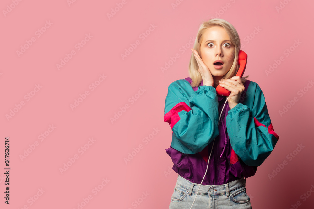 Beautiful blonde woman in 90s clothes with headset Beautiful blonde woman in 90s clothes with headset