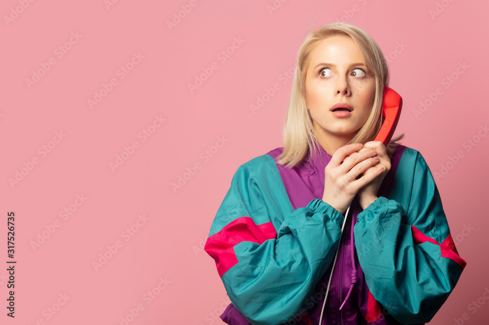 Beautiful blonde woman in 90s clothes with headset Beautiful blonde woman in 90s clothes with headset