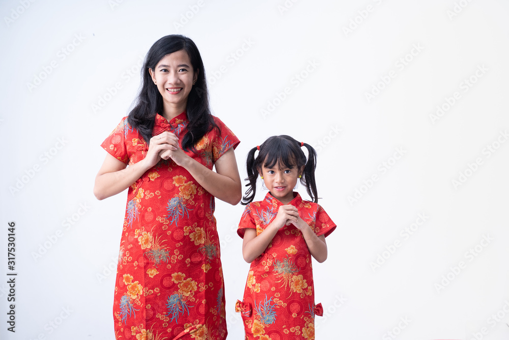 Obraz premium happy chinese new year. asian girl with Congratulation gesture