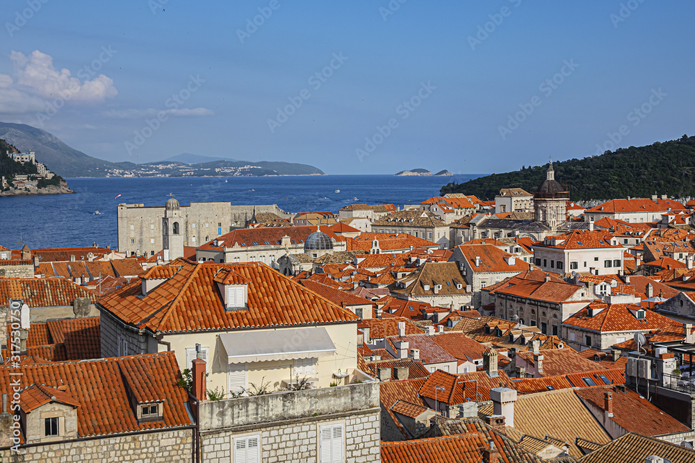 Orange-tiled roofs of the magnificent Old Town of Dubrovnik from the City Walls. Dubrovnik, Mediterranean, Croatia.