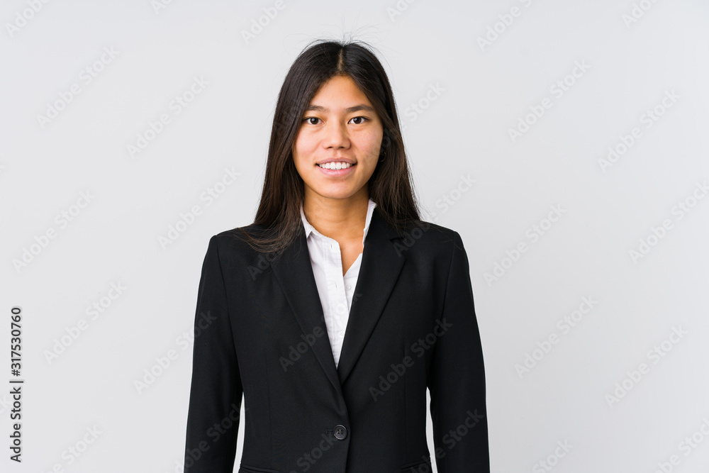 Young asian business woman happy, smiling and cheerful. Young asian business woman happy, smiling and cheerful.
