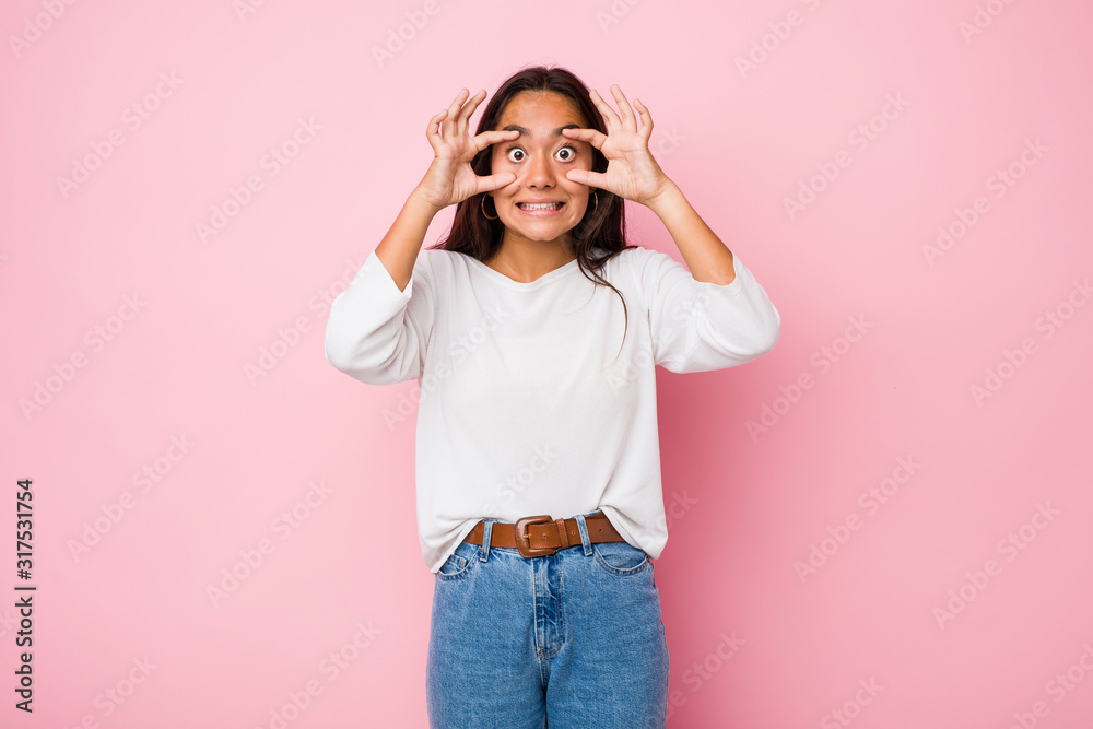 Young mixed race indian woman keeping eyes opened to find a success opportunity. Young mixed race indian woman keeping eyes opened to find a success opportunity.