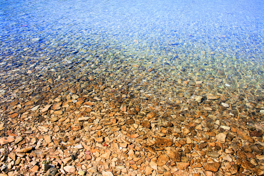water and pebbles in N.P. Brioni, Croatia