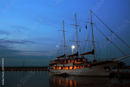 Wallpaper Mural sailing boat in the evening in the port of N.P. Brioni, Croatia Torontodigital.ca