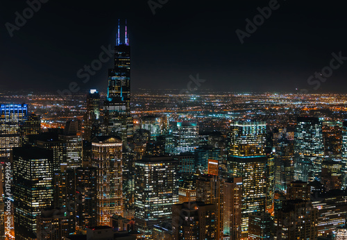 Chicago cityscape skyscrapers at night aerial view