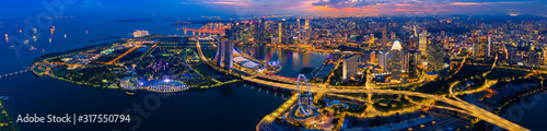 Photography Panorama Aerial view of the Singapore landmark financial business district at sunset scene with skyscraper and beautiful sky