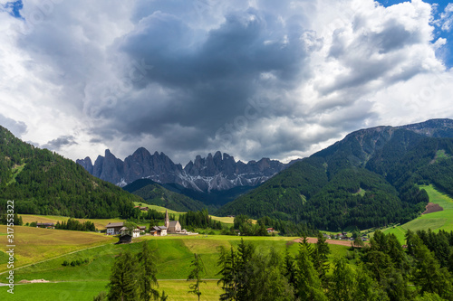 Scenic view of Santa Maddalena village church. Dolomites, Val di Funes, Italy.