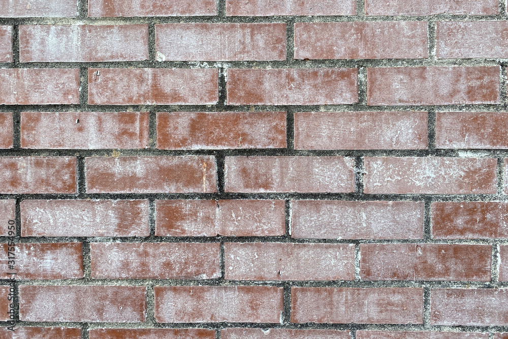 Naklejka premium faded white washed red brick wall