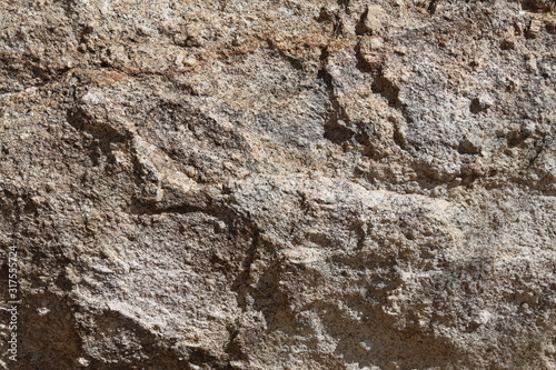 rock surface deep shadows nature