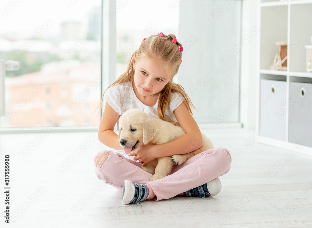 Nice girl holding puppy Nice girl holding puppy