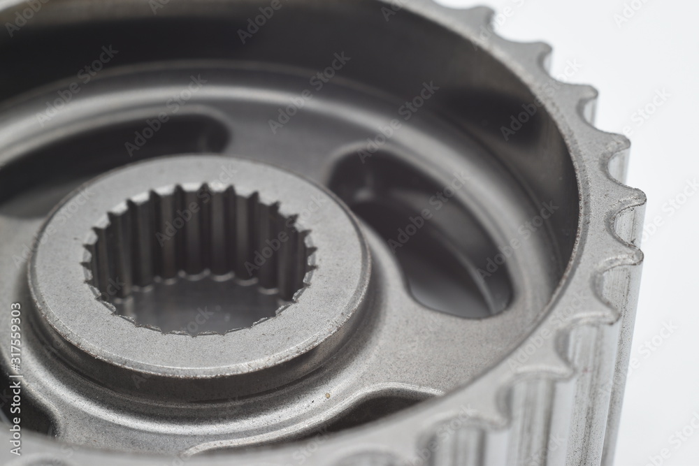 a gear photographed in close-up a gear photographed in close-up