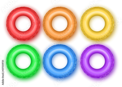 Set of colorful lifebuoys of bright and colorful colors isolated on white background, Realistic Detailed 3d Color Inflatable Swim Rings Set for Safety Swimming and Rescue in Water Vector illustration