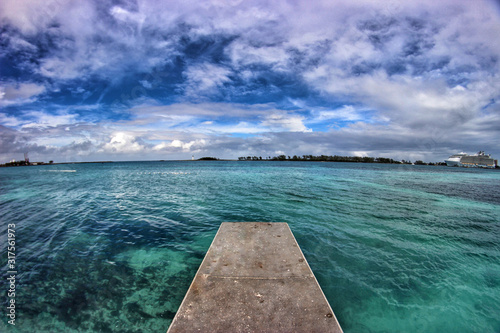 diving board and tropic sky and sea