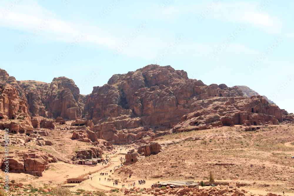 Panorama of ancient city of Petra with street of facades, amphitheatre and caves in Jordan