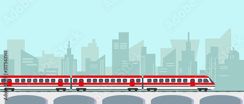 Passenger hight speed train on bridge in city.