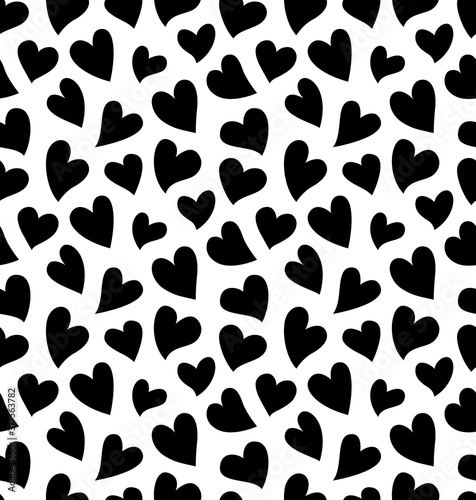 Seamless pattern with black hearts on the white background. Good for printing on Saint Valentine's Day Cards, on fabric or clothes.