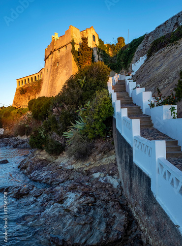 Sunrise over the ancient castle on Atlantic coast, Vila Nova de Milfontes, Portugal