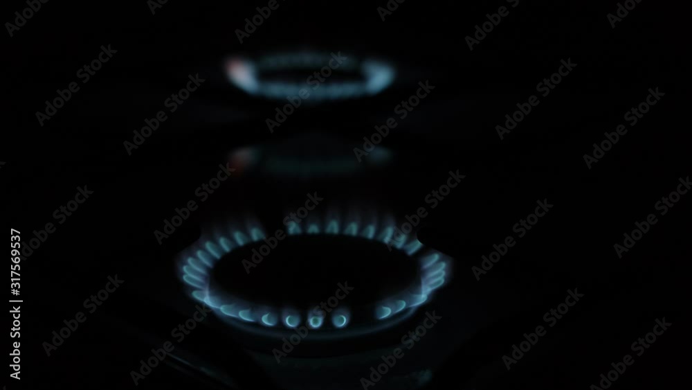 natural gas burns on a gas stove in the kitchen natural gas burns on a gas stove in the kitchen