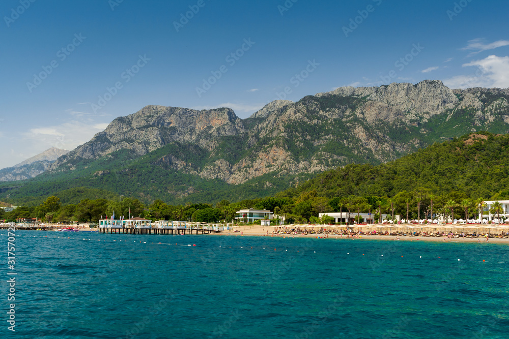Sea view on coast, resorts and Taurus Mountains near Kemer, Turkey.