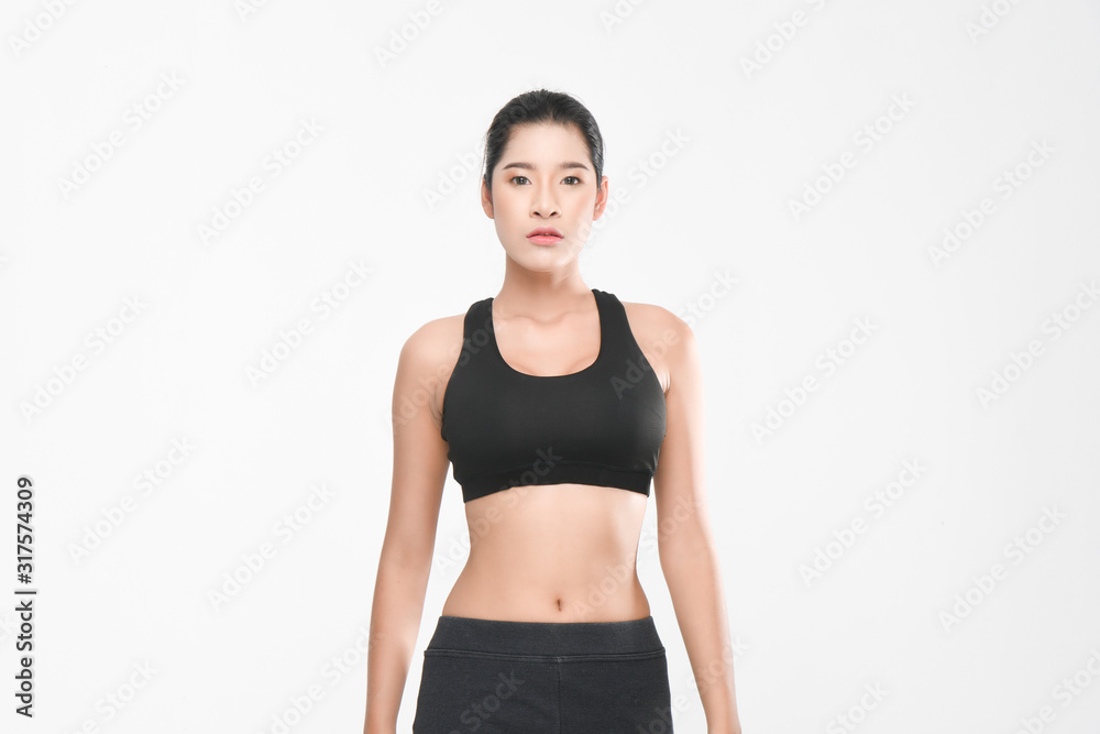 Shapely woman long hair wearing black fitness clothes in a series of exercises isolated on white background. Shapely woman long hair wearing black fitness clothes in a series of exercises isolated on white background.