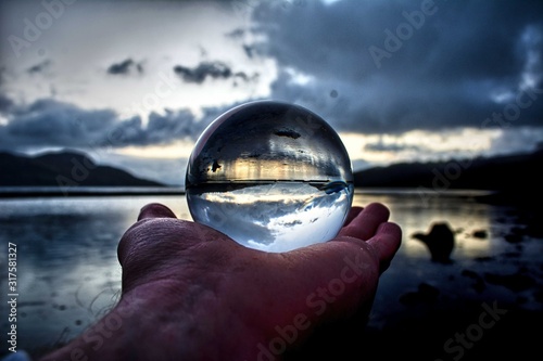 Lensball sunrise over lake in scotland landscapes