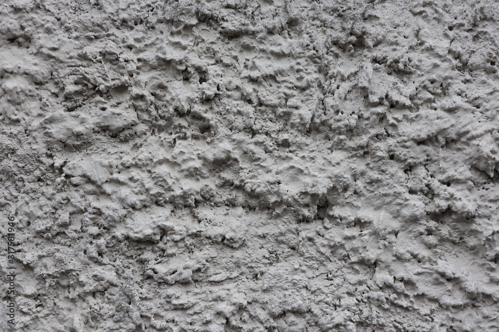 Background concrete texture. The wall of an unfinished building.
