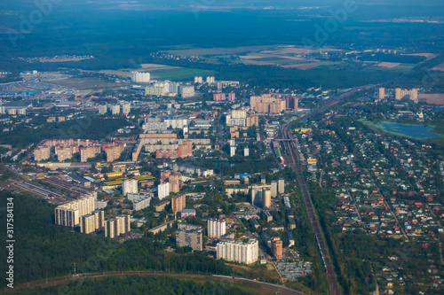 Aerial view of multi-storey houses district © Anton Gvozdikov