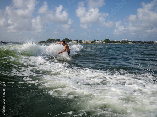 Man loses balance and falls to the water while wakeboarding in Miami