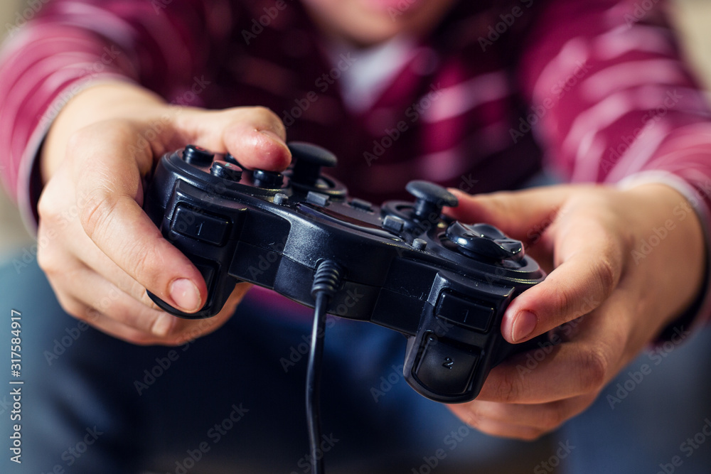 Closeup image of hands holding the game controller.