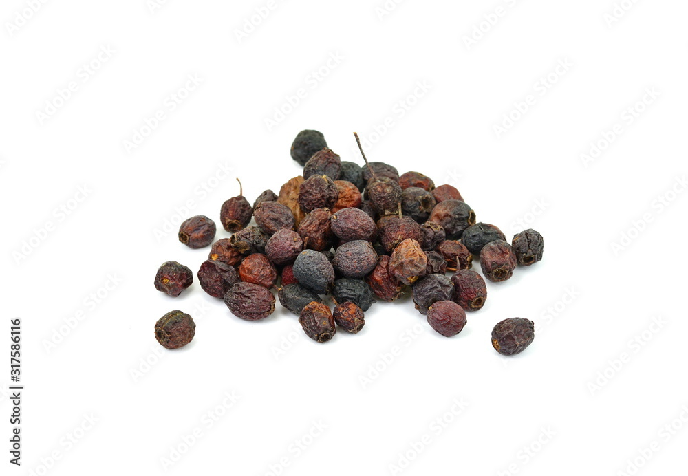 Dried medicinal herbs raw materials isolated on white. Fruit of Crataegus commonly called hawthorn, thornapple, May-tree, whitethorn, or hawberry. Cure for the heart. Dried medicinal herbs raw materials isolated on white. Fruit of Crataegus commonly called hawthorn, thornapple, May-tree, whitethorn, or hawberry. Cure for the heart.
