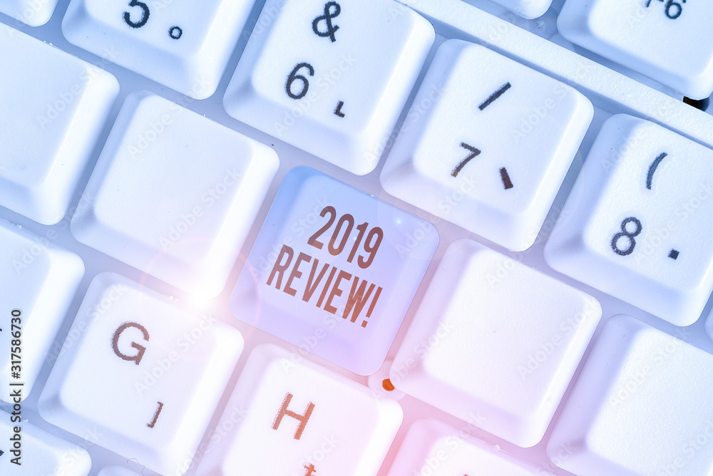 Text sign showing 2019 Review. Business photo showcasing remembering past year events main actions or good shows Text sign showing 2019 Review. Business photo showcasing remembering past year events main actions or good shows