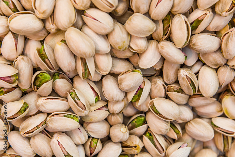 Close up of fresh pistachios. Whole background. Close up of fresh pistachios. Whole background.