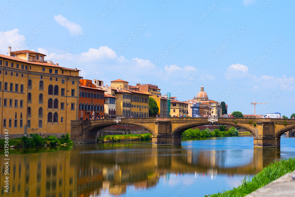 View of Florence. Bridge over the Arno River. Cathedral. Summer time.