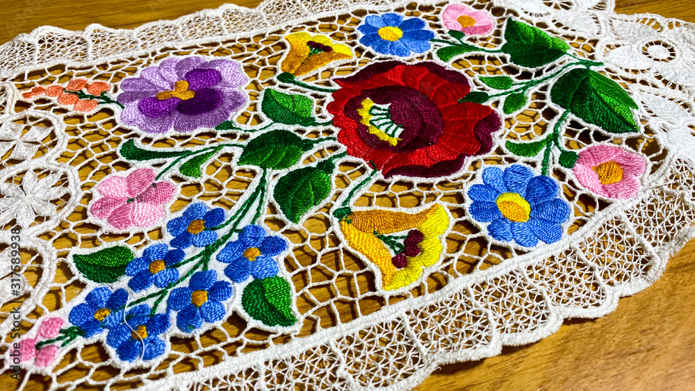 Fototapeta premium Unique embroidery hand made product on the table.