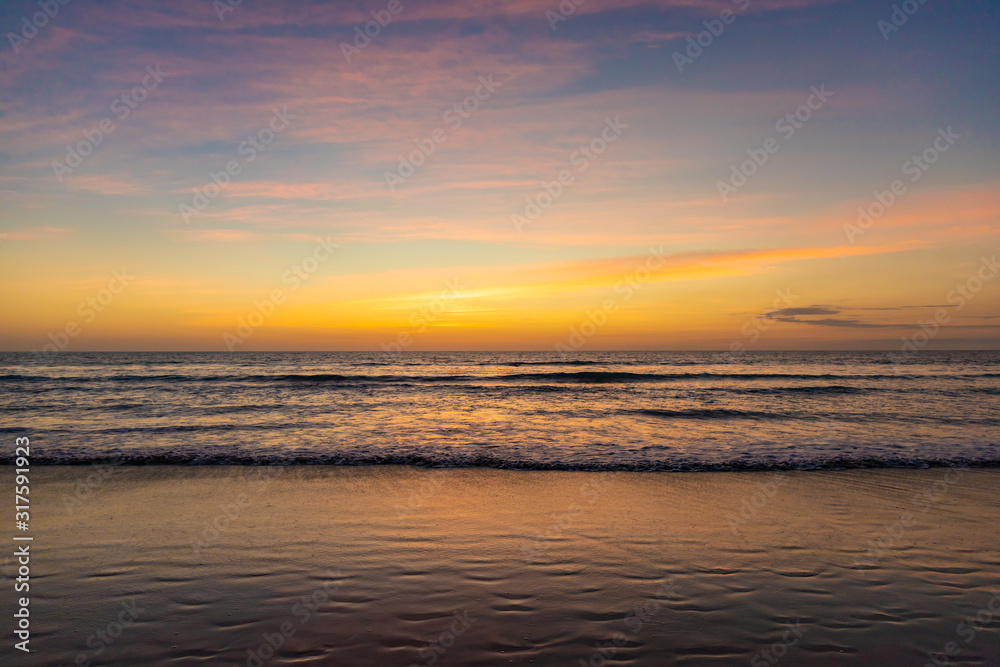 Beautiful sunset on the ocean Kuta beach of Bali island, Indonesia