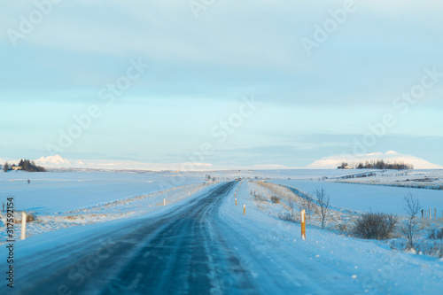 Picturesque winter landscape of Iceland. The perfect road to perspective © Kate