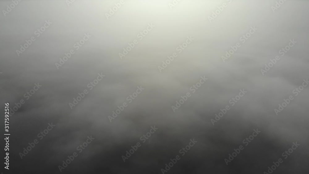 Flying over clouds. Video shot by drone in early morning. Smog above city. Real time footage. Flying over clouds. Video shot by drone in early morning. Smog above city. Real time footage.