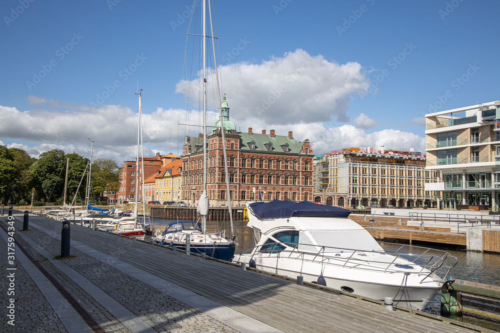 Landskrona Port, marina and surrounding mixed-use neighborhood with water tower in the back in Landskrona, Sweden