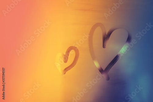 Two romantic hearts on color background. Happy valentines day holidays greeting. Loving couple. Gradient image