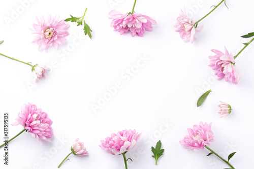 Pink flowers on white background. Romantic background for Valentine Day, Mothers Day or Birthday. Top view.