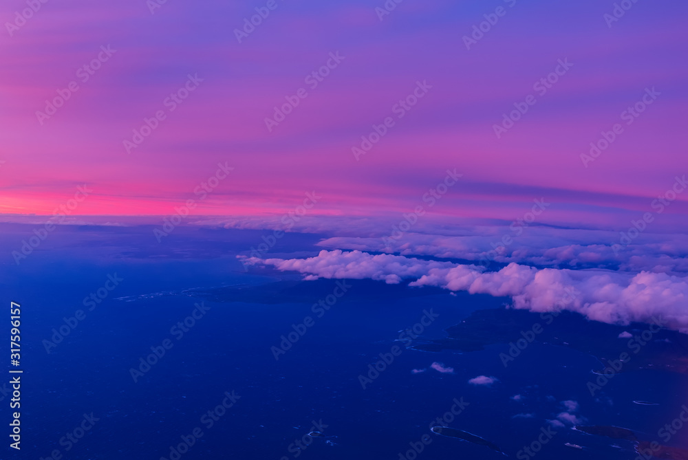 Sunset over Reykjavik from the airplane in september 2019