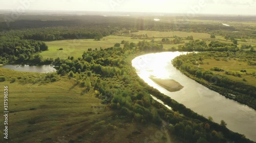 Wallpaper Mural Aerial View Green Forest Woods And River Landscape In Sunny Summer Day. Top View Of Beautiful European Nature From High Attitude In Autumn Season. Drone View. Bird's Eye View Torontodigital.ca
