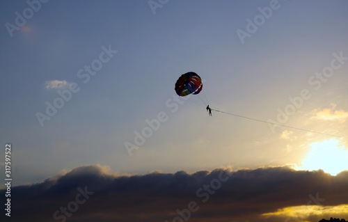 Parasailing at Patong Phuket Thailand at Sunset beautiful colours