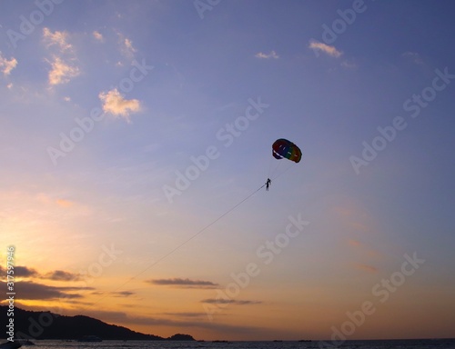 Parasailing at Patong Phuket Thailand at Sunset beautiful colours