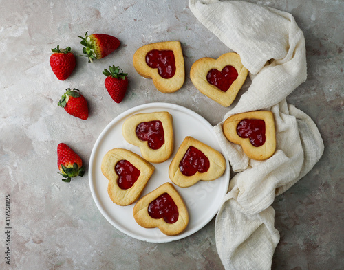 cookies in the form of hearts with strawberry jam, St. Valentine's day consept