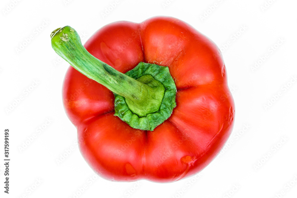 Sweet red bulgarian pepper with a green tail close-up, isolated on a ...