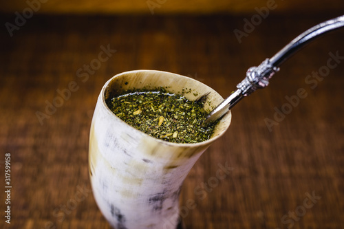 Cuia de Tereré or tererê, made with ox horn. It is a typical South American drink made with the infusion of yerba mate in cold water. Consumed in Santa Catarina, Paraná, Mato Grosso and Brasilia.